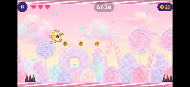 Gravity Panic gameplay in the candy world with coins and ceiling hazards.